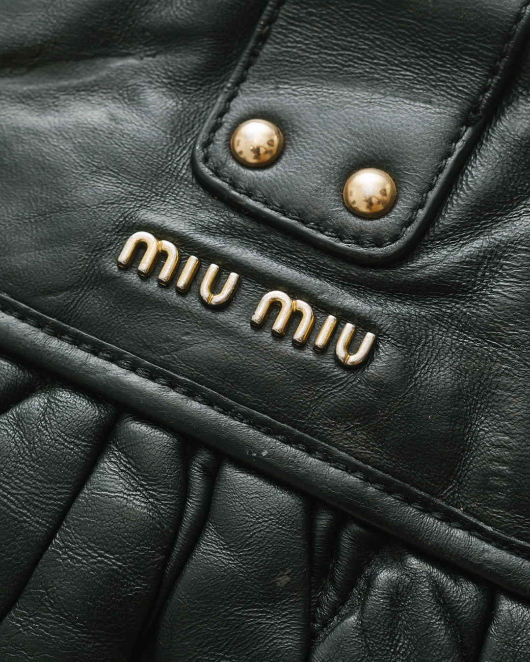 Miu miu matelasse coffer bag in black