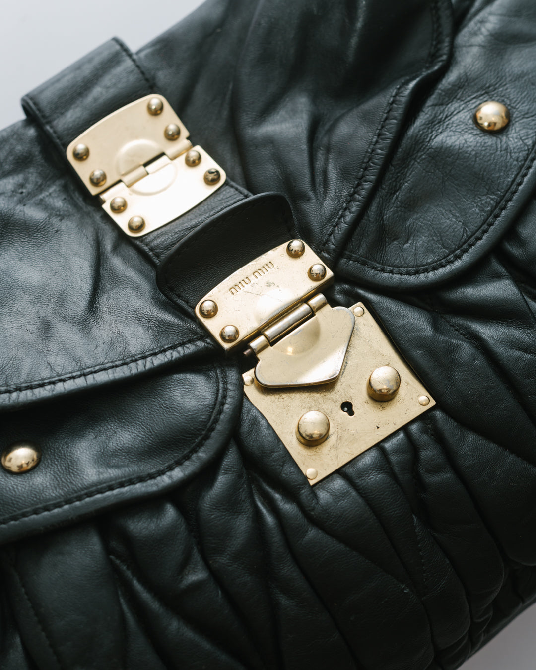 Miu miu matelasse coffer bag in black