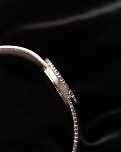 1970s Omega Diamond & Emerald Bezel