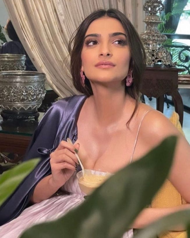 Sonam Kapoor in an Aimee Loved satin shirt