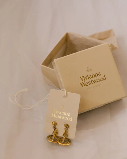 Dangling orb earrings