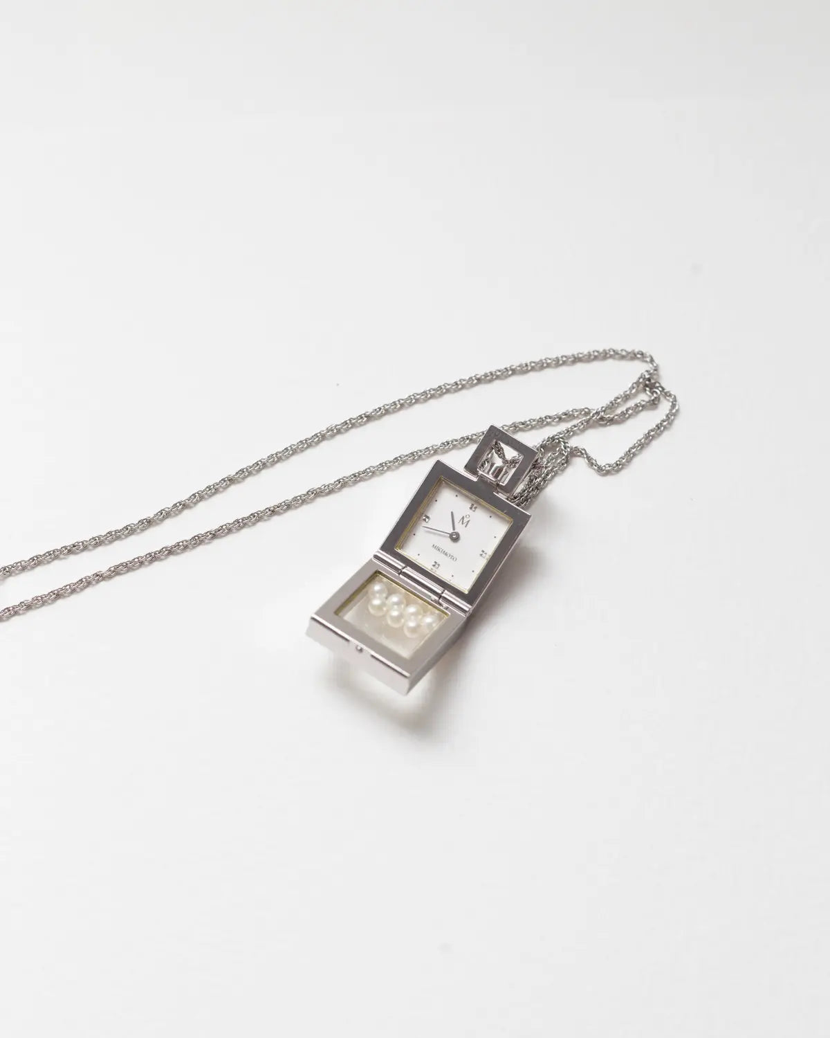 Mikimoto floating pearls pendant watch