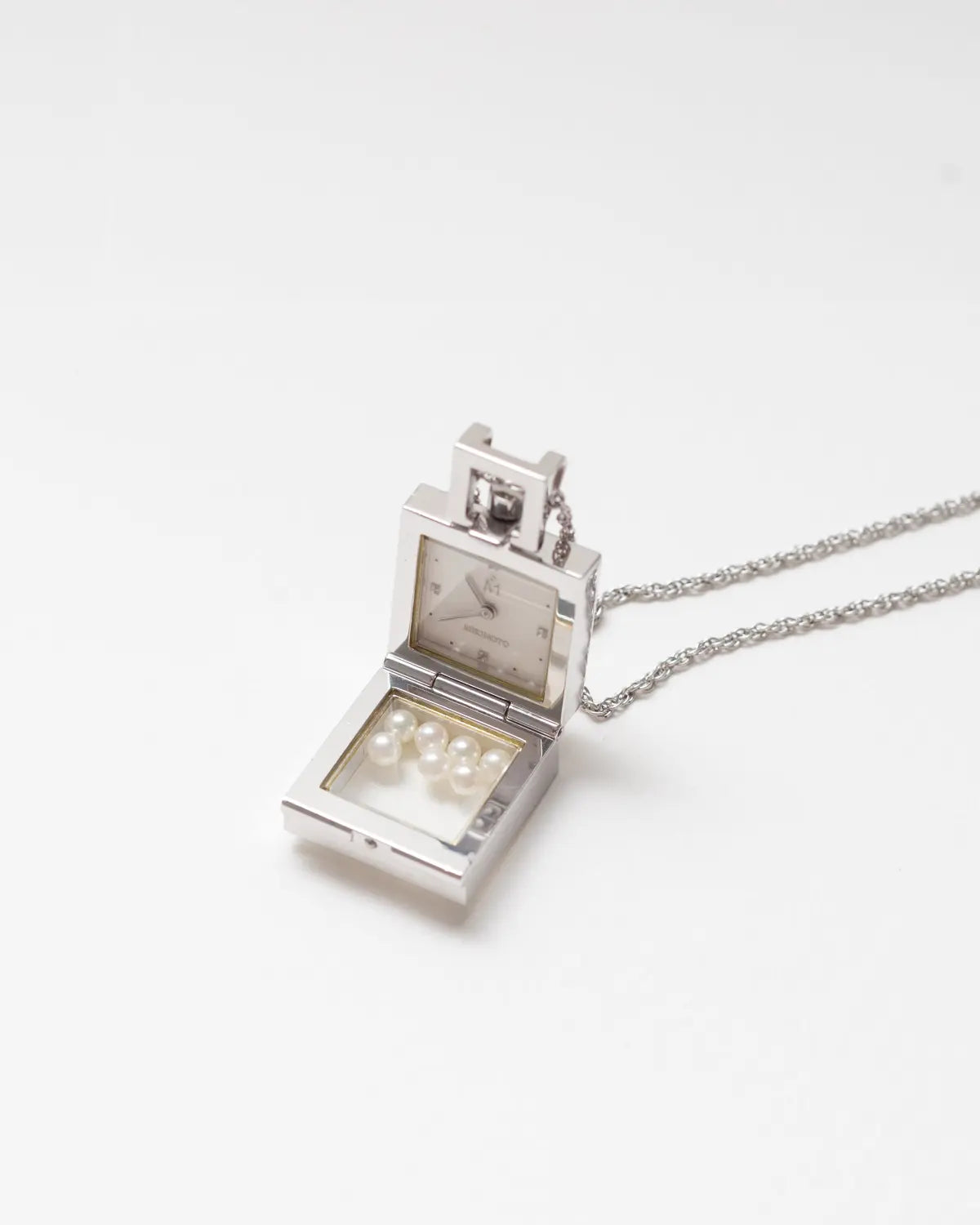 Mikimoto floating pearls pendant watch