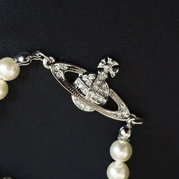 Pearl bracelet with rhinestone detailed orb