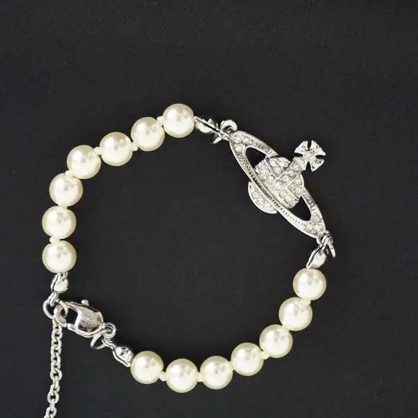 Pearl bracelet with rhinestone detailed orb