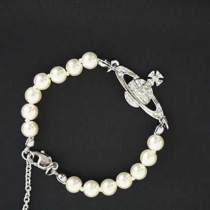 Pearl bracelet with rhinestone detailed orb