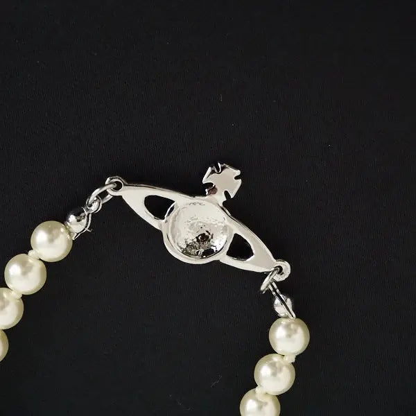Pearl bracelet with rhinestone detailed orb