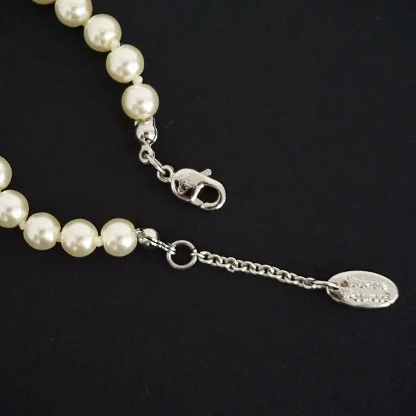 Pearl bracelet with rhinestone detailed orb
