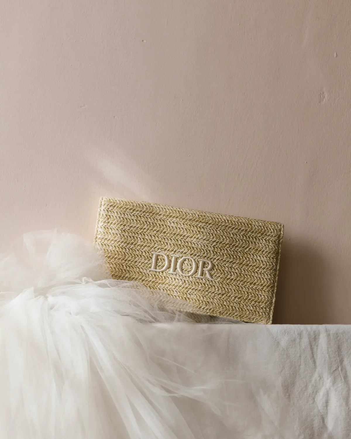 Raffia clutch bag