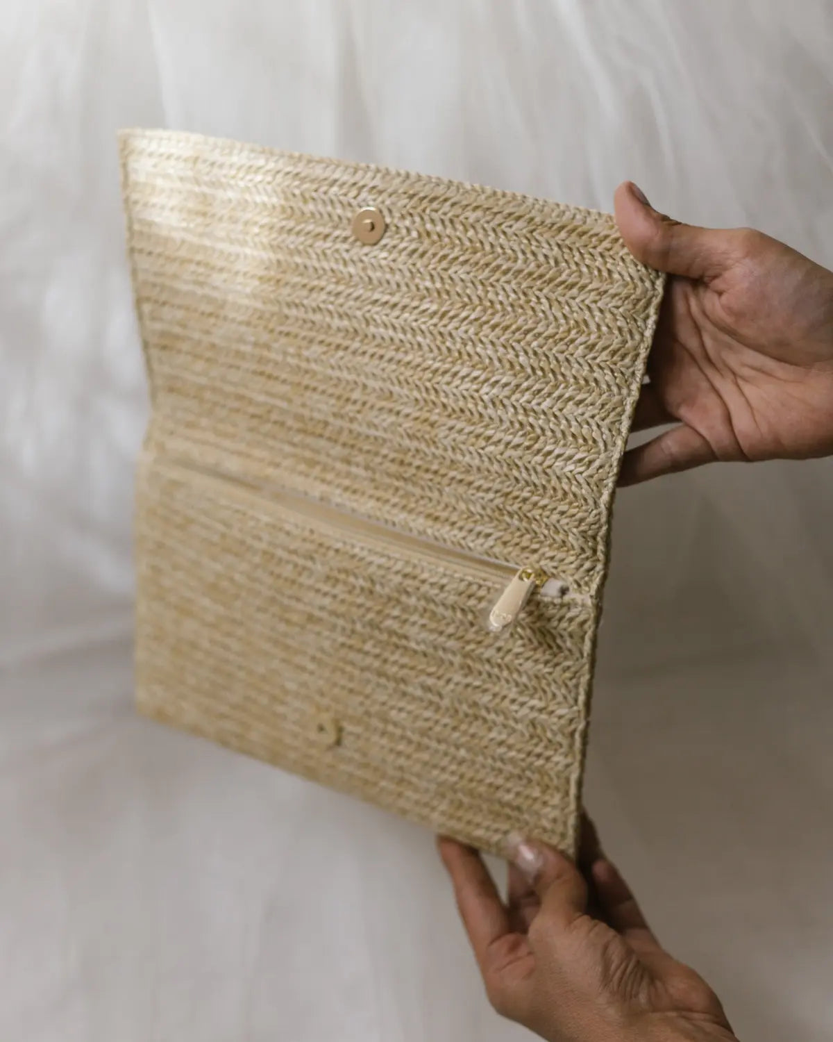 Raffia clutch bag