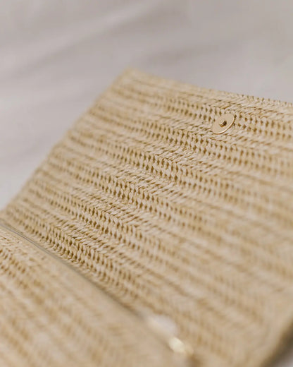 Raffia clutch bag
