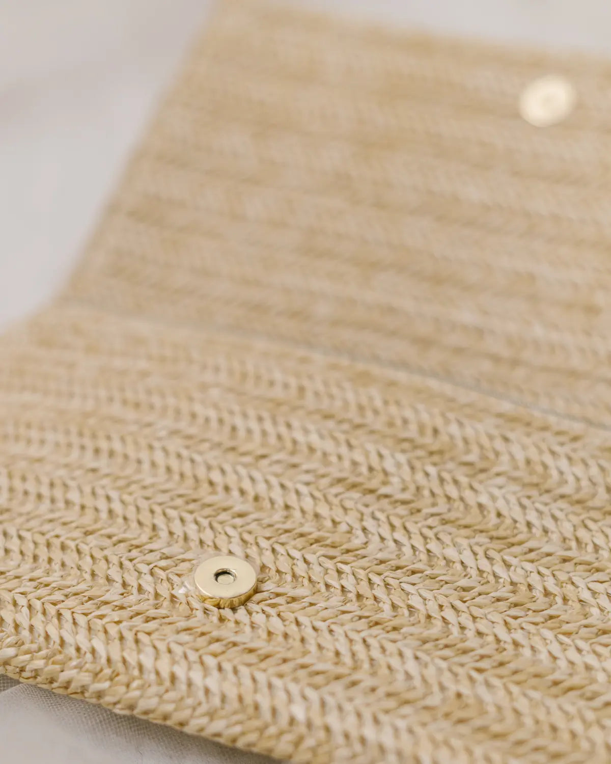 Raffia clutch bag