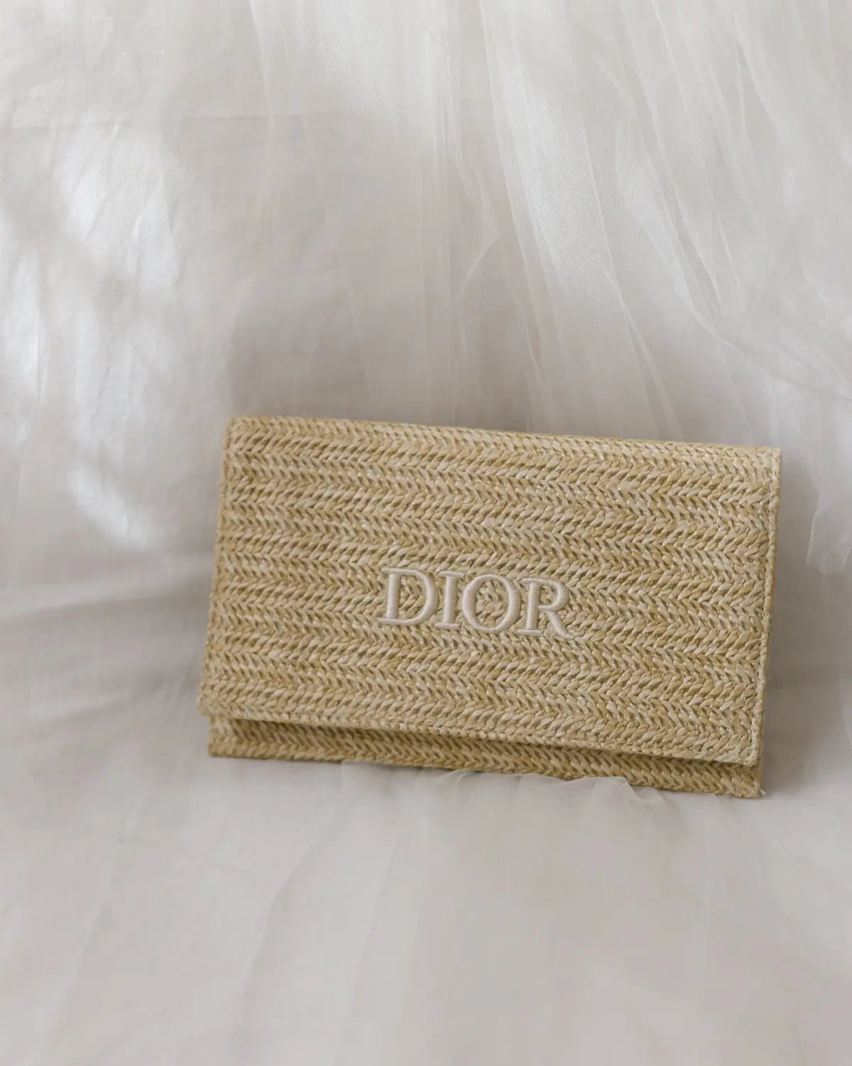 Raffia clutch bag