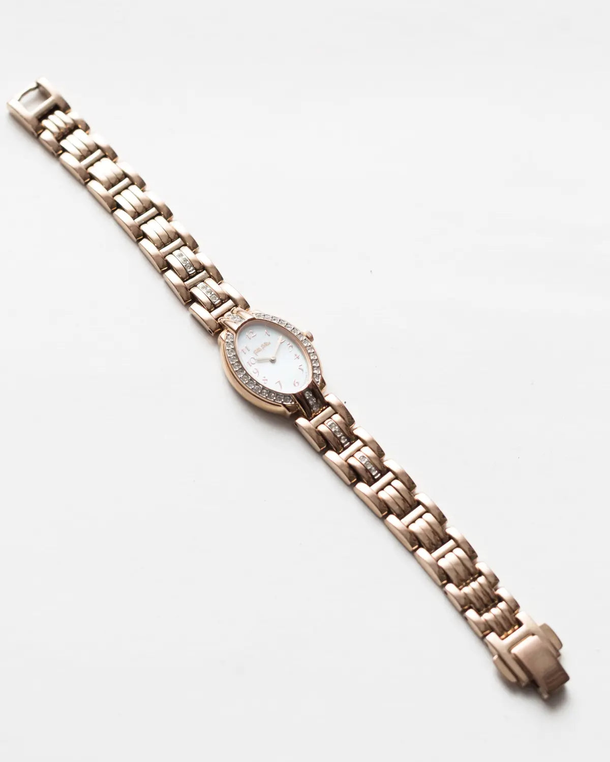 Quartz rose gold follie with mop dial watch