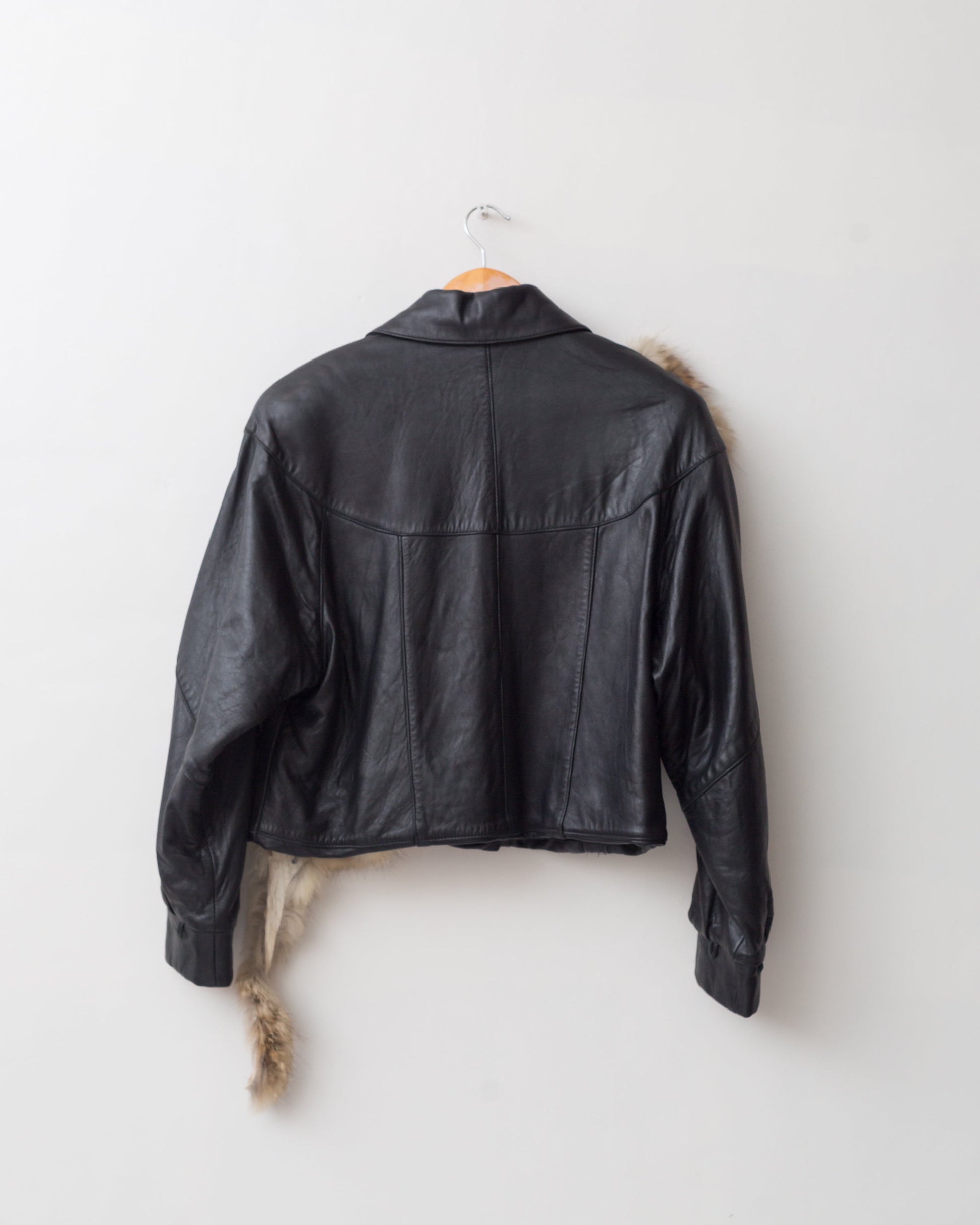 Upcycled cropped leather jacket with vintage fur details