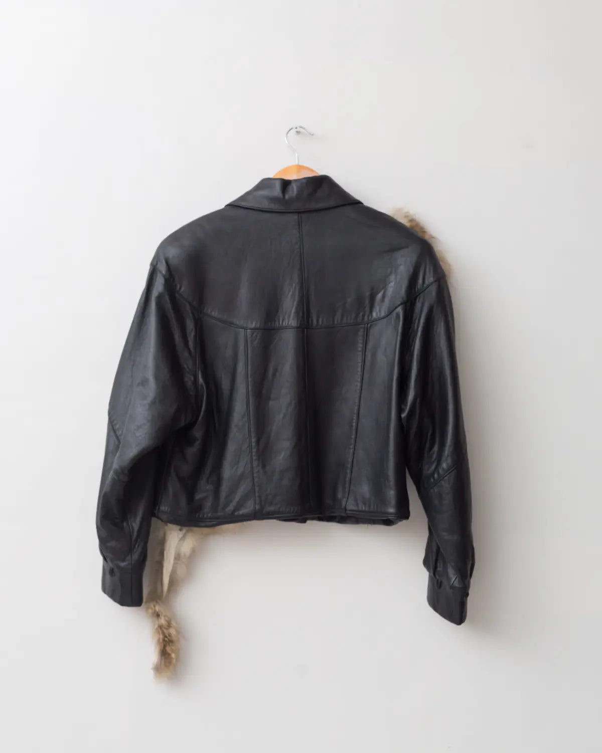 Upcycled cropped leather jacket with vintage fur details
