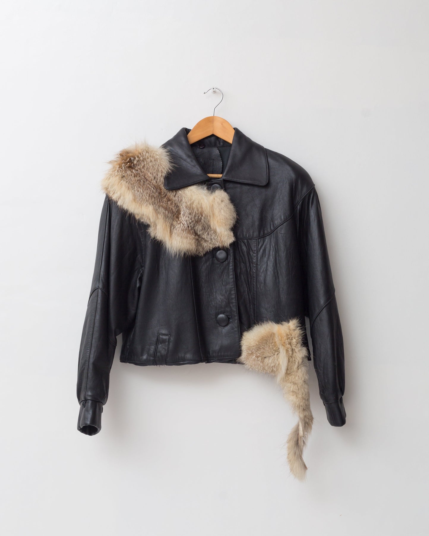 Upcycled cropped leather jacket with vintage fur details