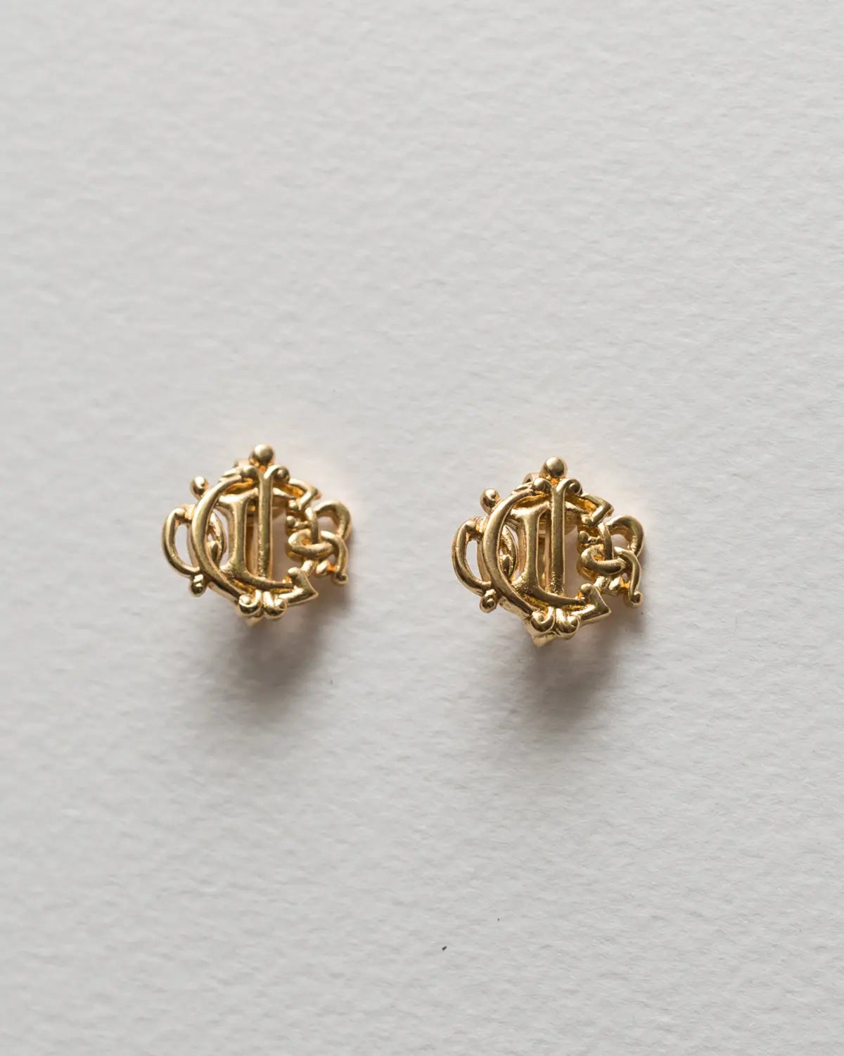 Christian dior vintage insignia clip ons