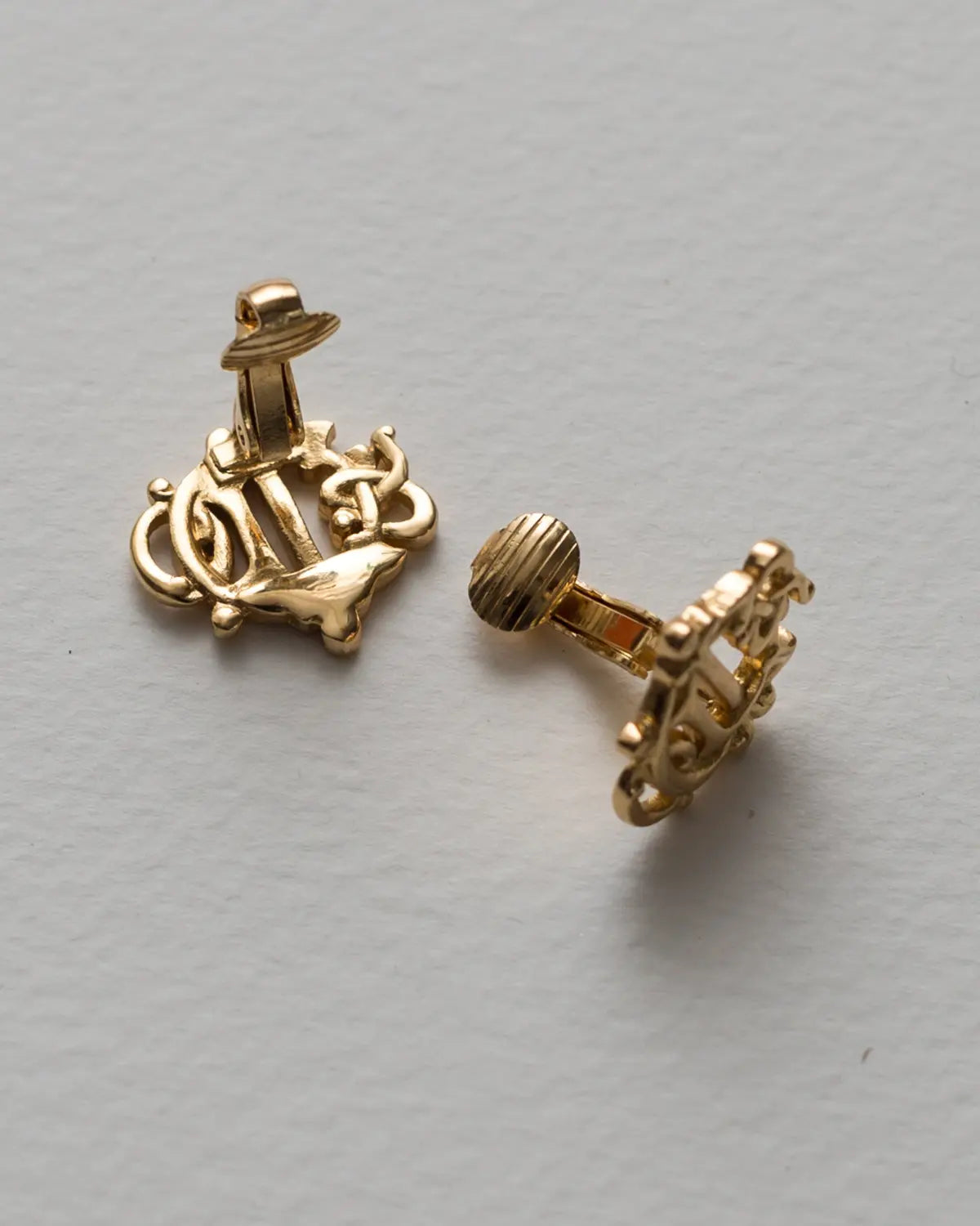 Christian dior vintage insignia clip ons