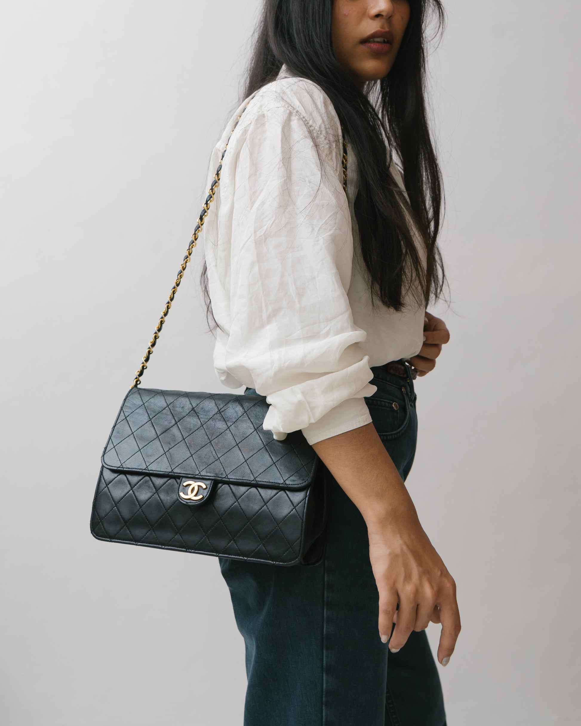 Half flap lambskin matelasse bag