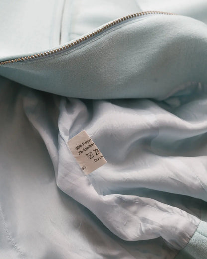 Rounded shoulder zip up jacket